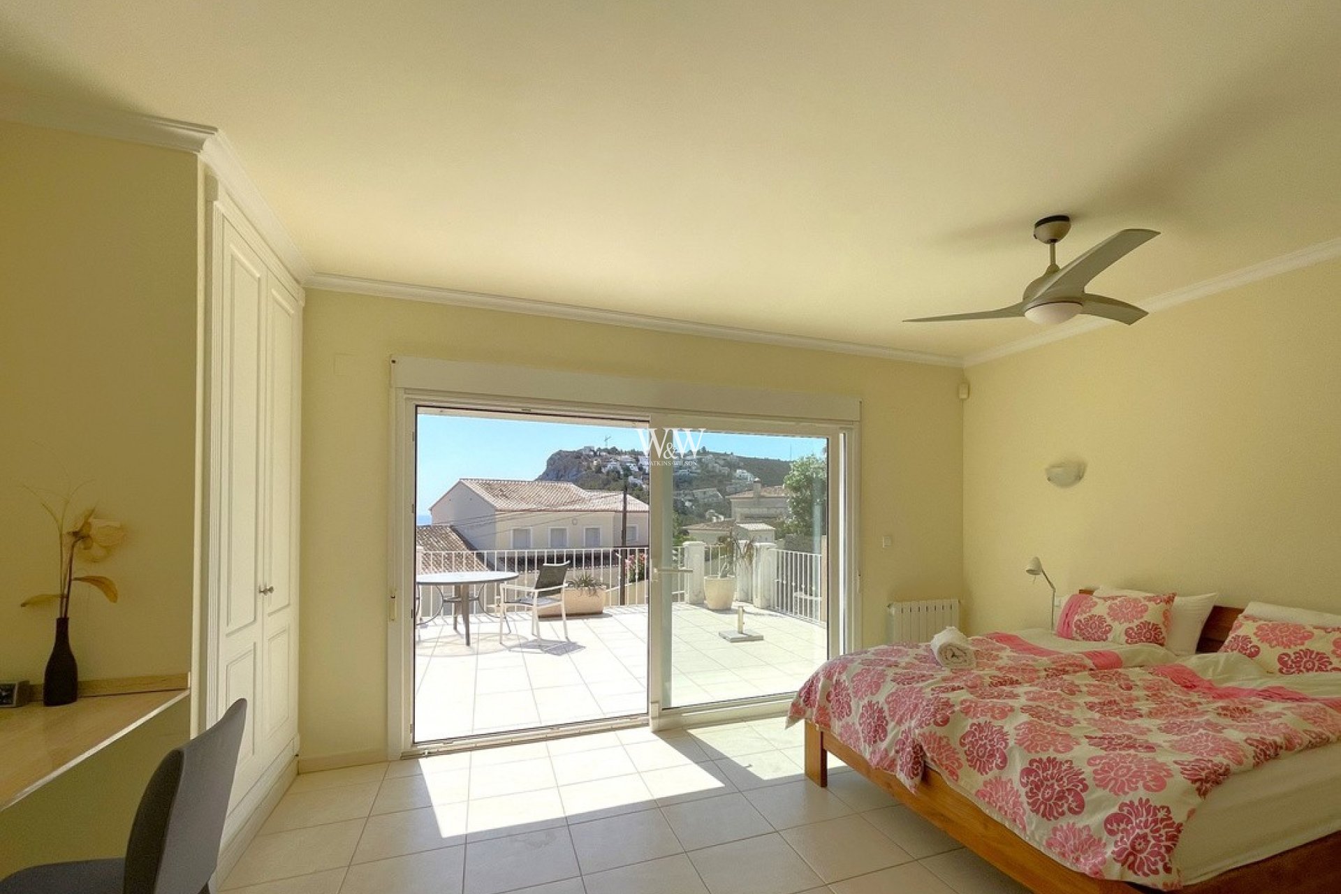 Double bedroom with patio doors to large terrace