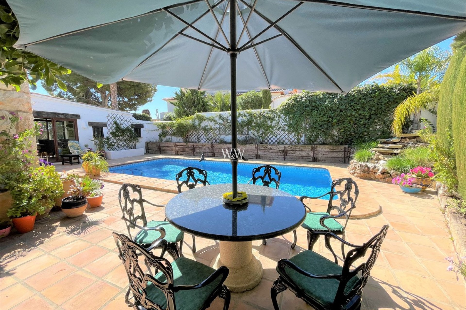 Terrace for outdoor dining by the pool