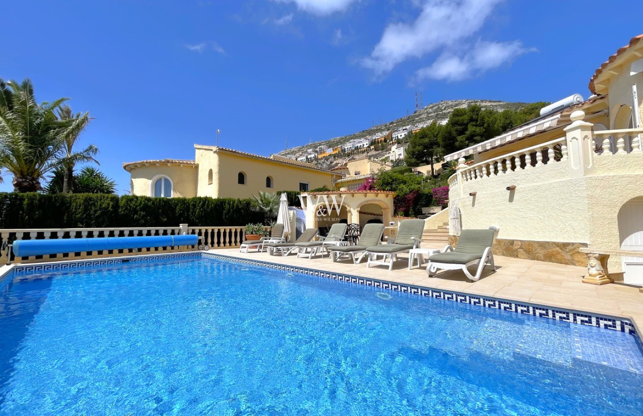 Across pool to terrace and BBQ area