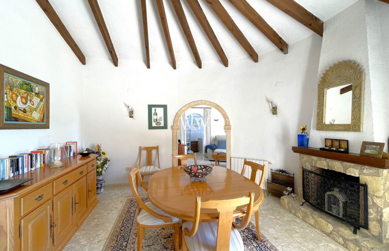 the dining room with fireplace