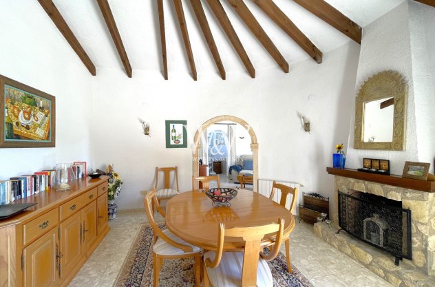 the dining room with fireplace