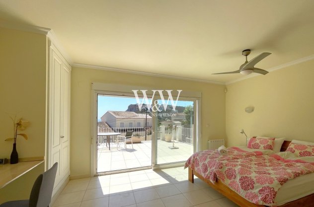 Double bedroom with patio doors to large terrace