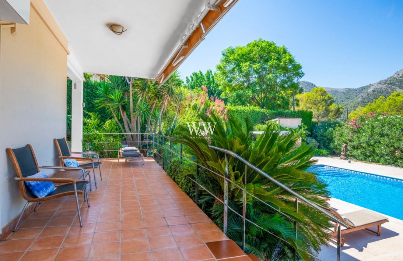 Terrace to front of property overlooking the pool and view