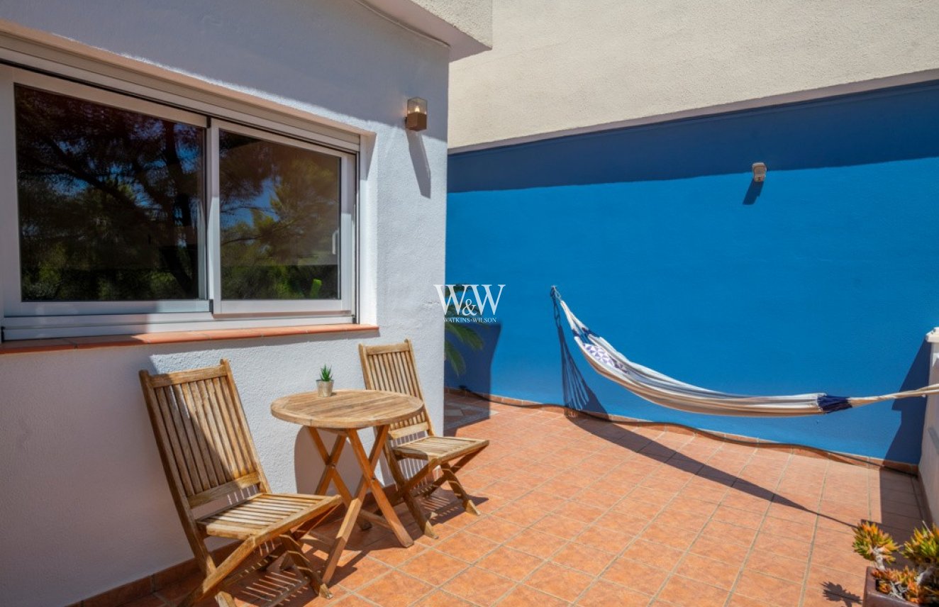 Outdoor terrace with view to woodland